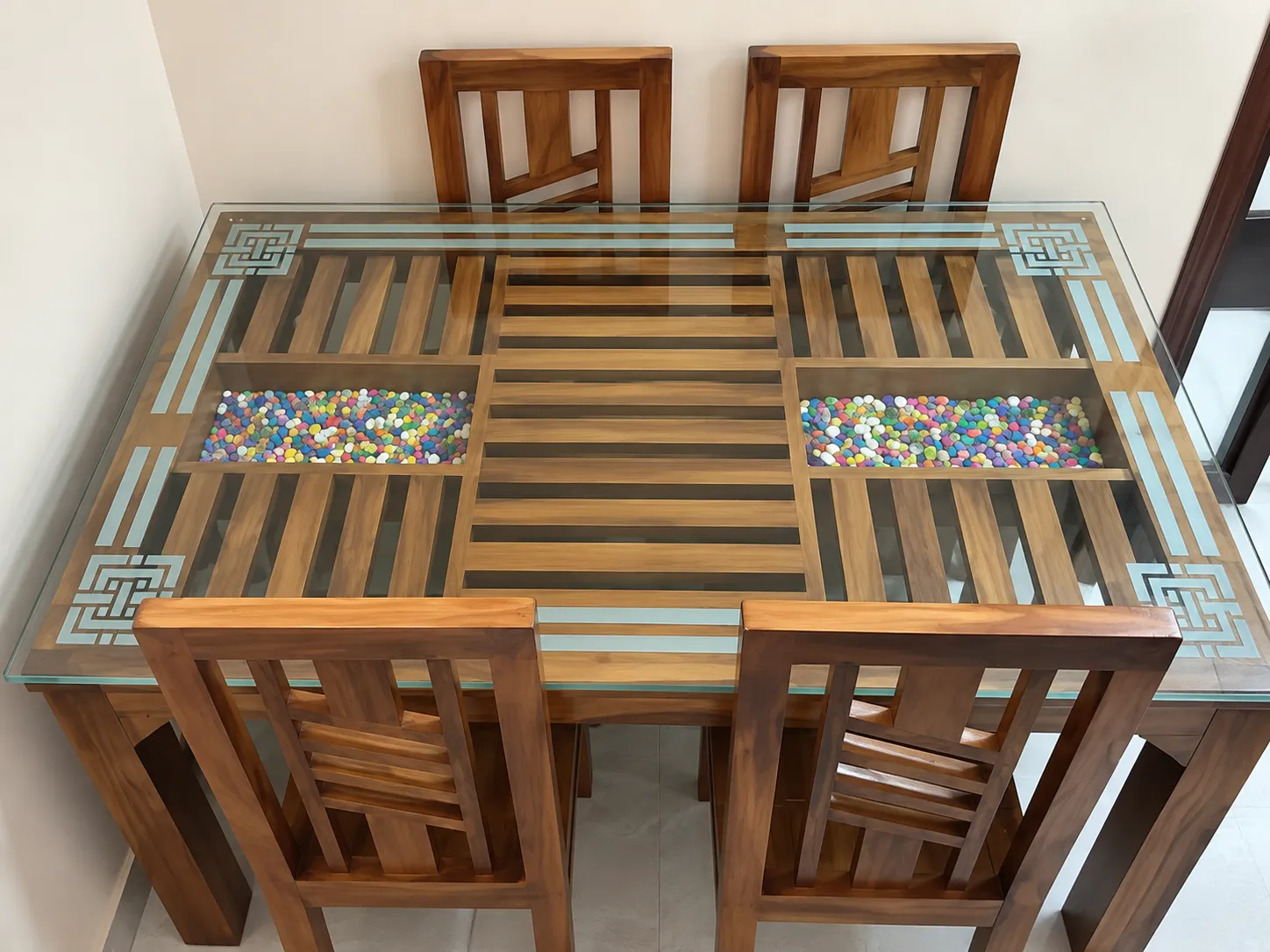 Kallingal hand-sculpted royal Nilambur teak dining table with brass inlay and carved apron